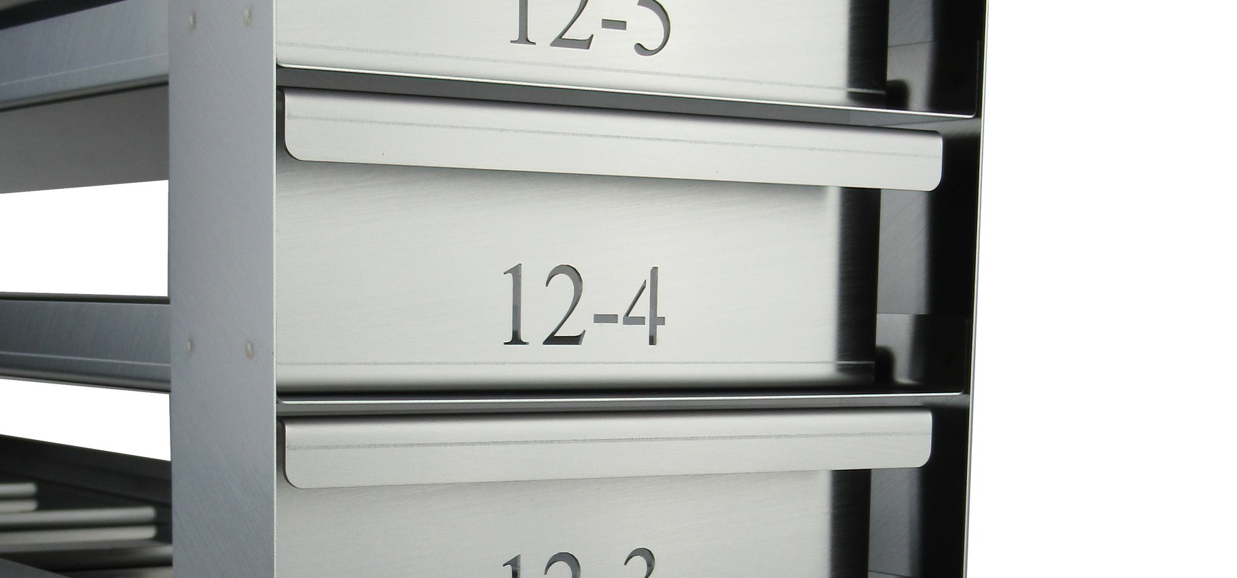 Beschriftung Num T&M Vertrieb